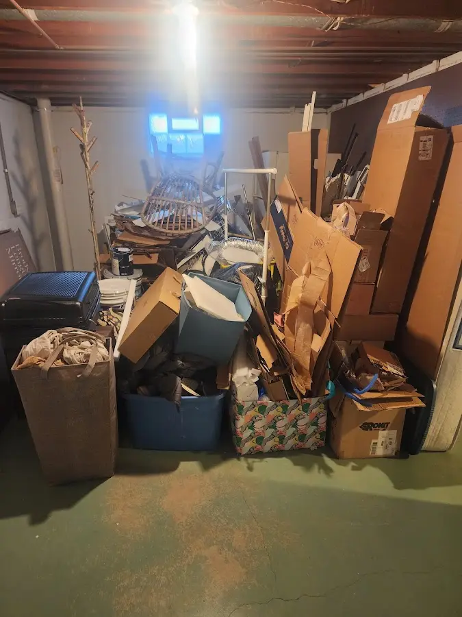 Roll-off dumpster container at job site for 4 Yard Dumpster Rental in Tyrone